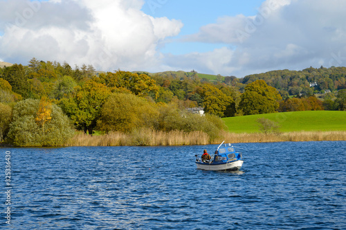 Lake Windermere a man fishing from a boat © Peter