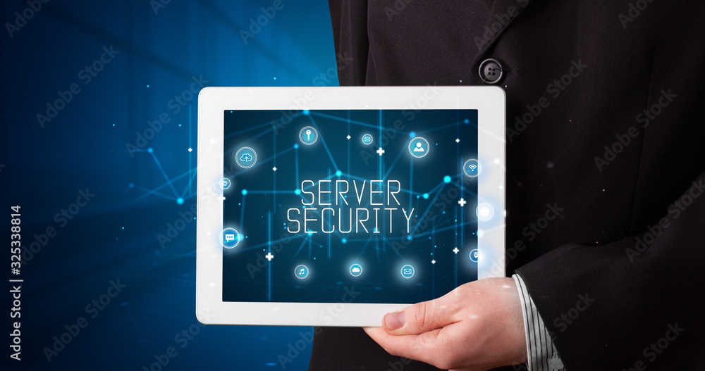 Young business person working on tablet and shows the digital sign: SERVER SECURITY Young business person working on tablet and shows the digital sign: SERVER SECURITY