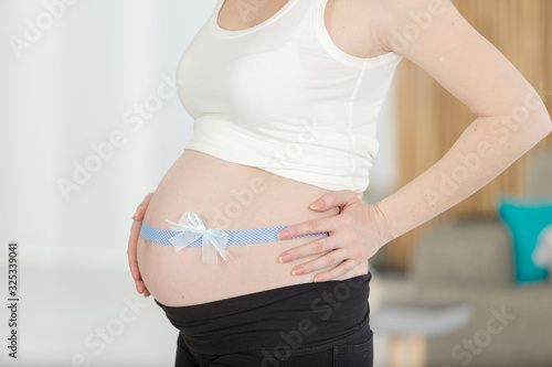 pregnant woman belly present concept