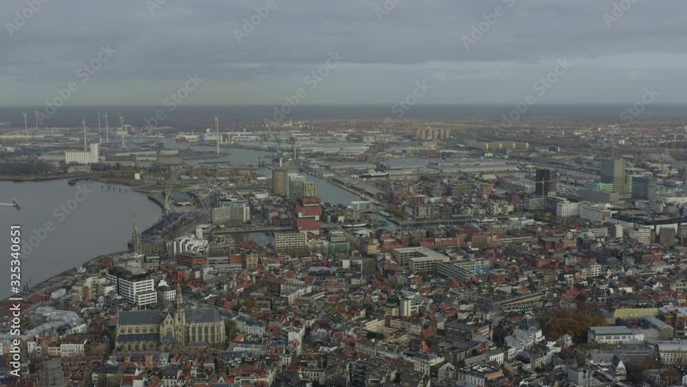 Antwerp Belgium Aerial v5 Flying backwards over downtown with views of industrial area, Eilandje and surrounding districts - November 2019 Antwerp Belgium Aerial v5 Flying backwards over downtown with views of industrial area, Eilandje and surrounding districts - November 2019