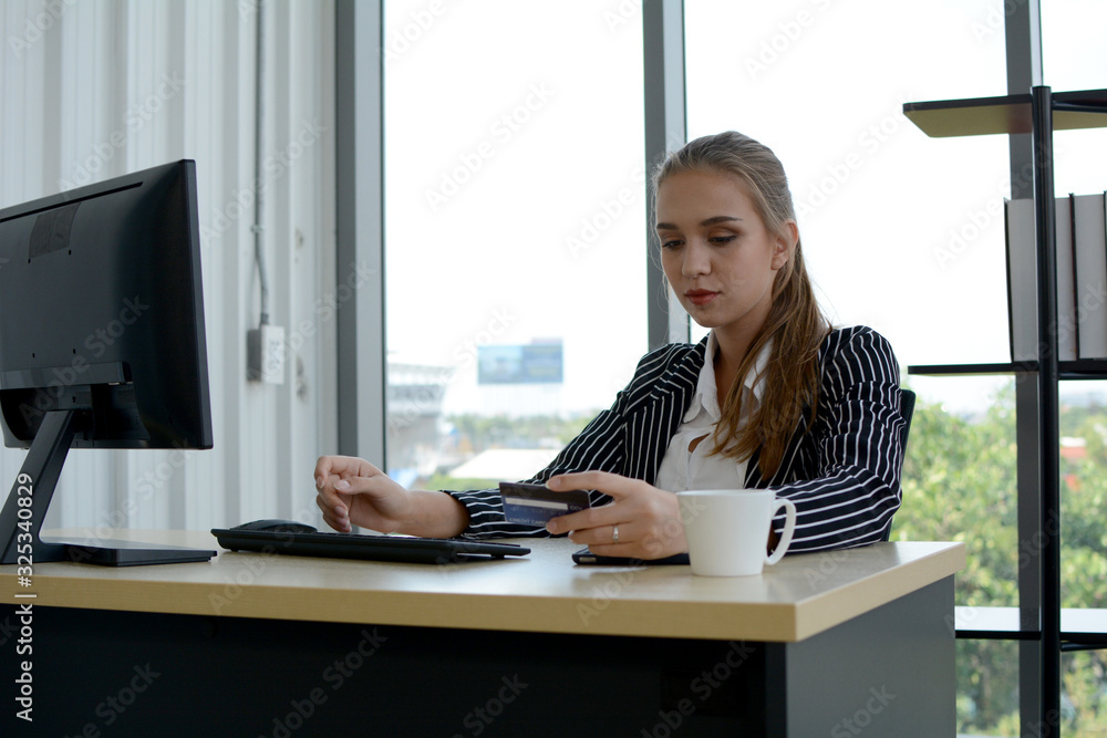 Business people sitting at desk and working with laptop computer. Business people sitting at desk and working with laptop computer.