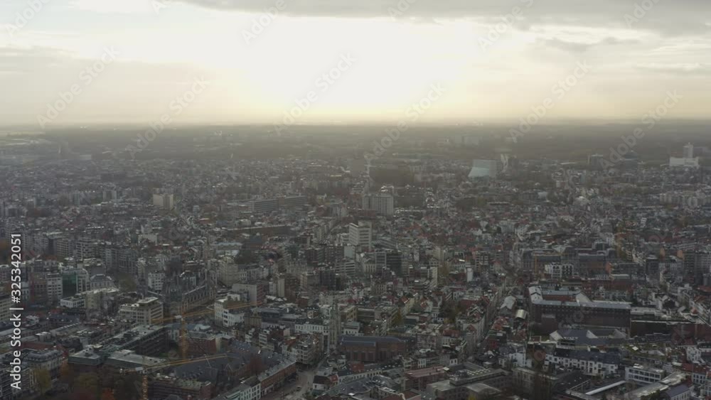 Antwerp Belgium Aerial v6 Panning around downtown with surrounding cityscape district views at sunset - November 2019 Antwerp Belgium Aerial v6 Panning around downtown with surrounding cityscape district views at sunset - November 2019