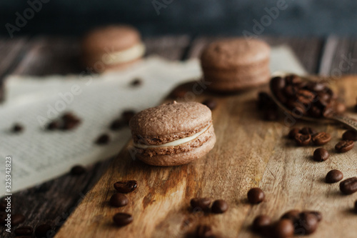 Macaroons. Delicious french dessert. Romantic composition with coffee and other elements.