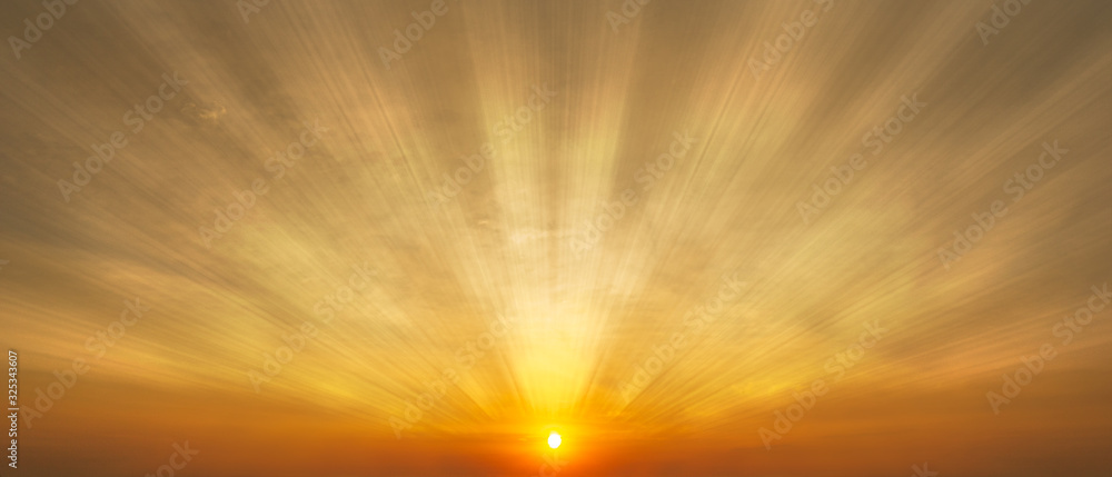 Gorgeous panorama scenic of the sunrise with sunlight and cloud on the orange sky - obrazy, fototapety, plakaty 