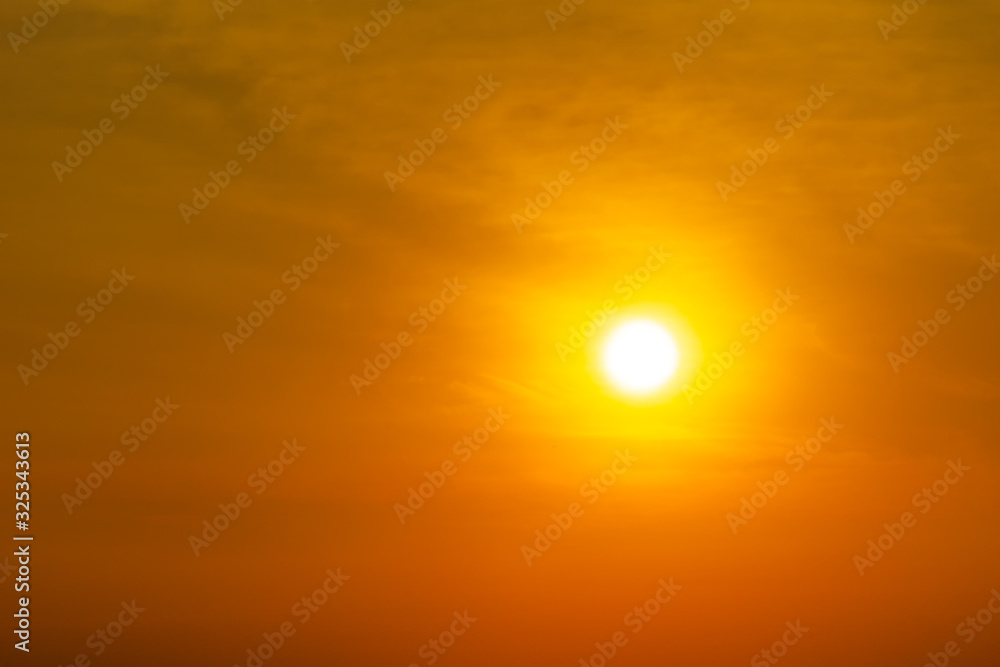 The sun on orange sky and clouds nature background