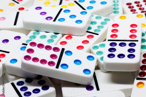 colorful dominoes in a pile on a table