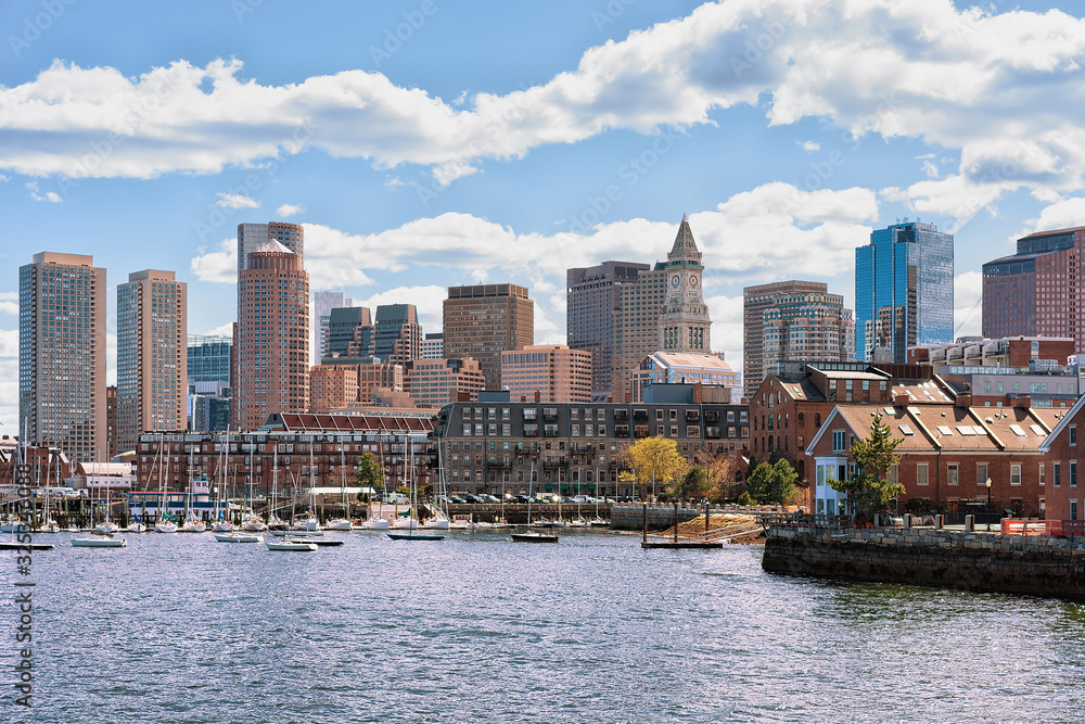 Fototapeta premium Floating boat with the skyline Boston MA America
