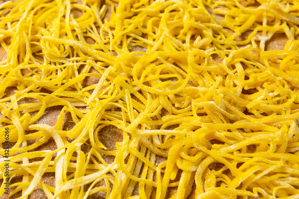homemade pasta. background with homemade noodles. top view Food texture homemade pasta. background with homemade noodles. top view Food texture