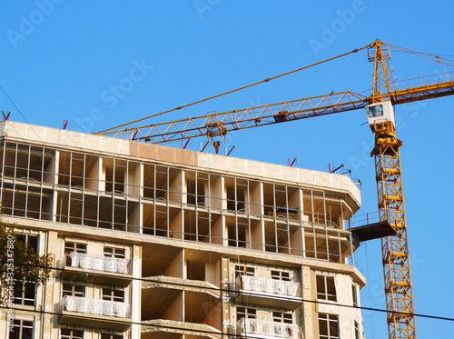 Construction site with crane and bulding. Construction site background.