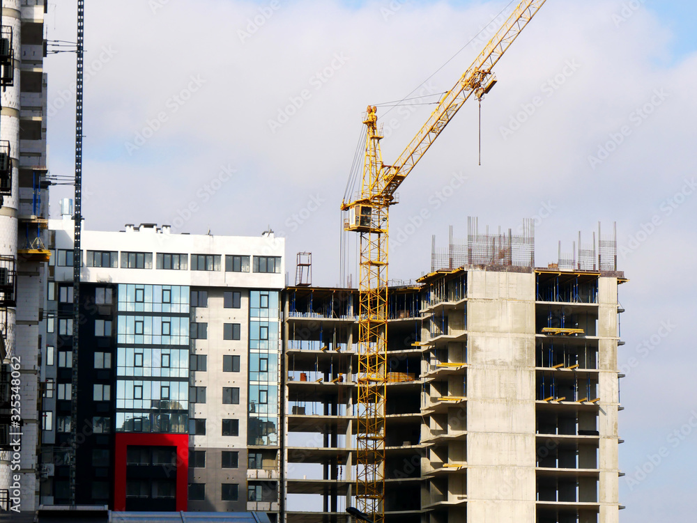 Construction site. Building site with crane. Concrete building under construction