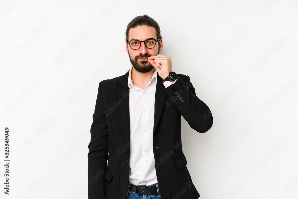 Young caucasian business man isolated on a white background with fingers on lips keeping a secret. Young caucasian business man isolated on a white background with fingers on lips keeping a secret.
