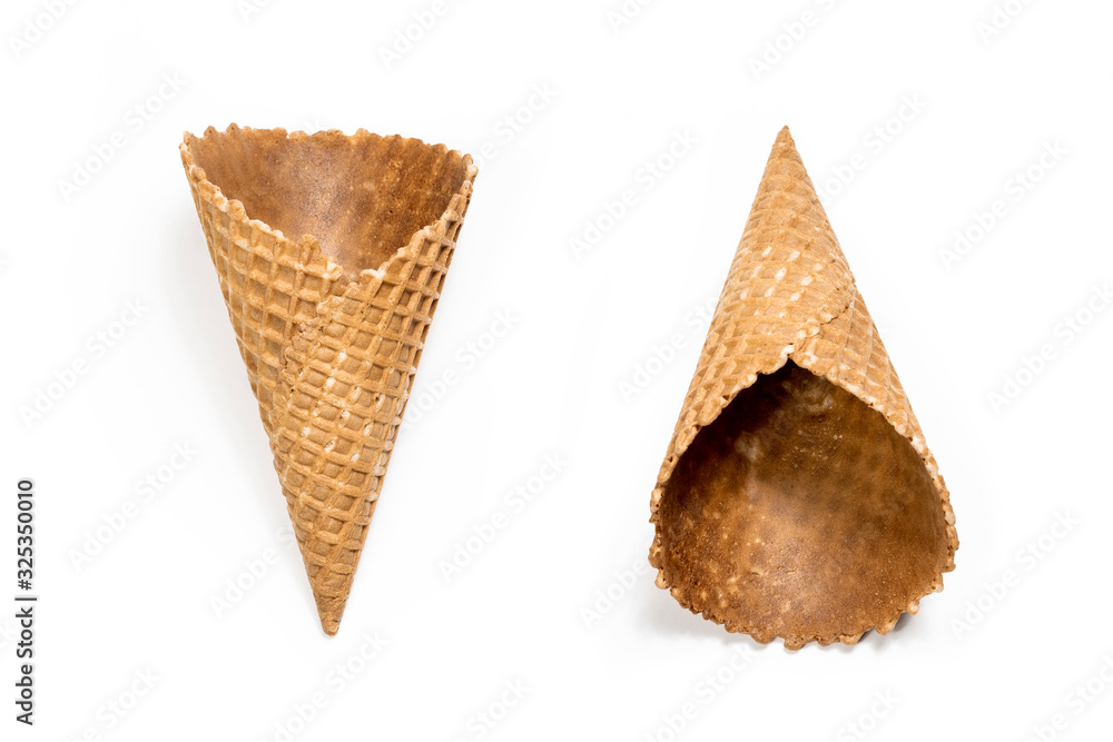 Ice cream waffle cones on white background, top view flat lay minimal summer concept style. Ice cream waffle cones on white background, top view flat lay minimal summer concept style.