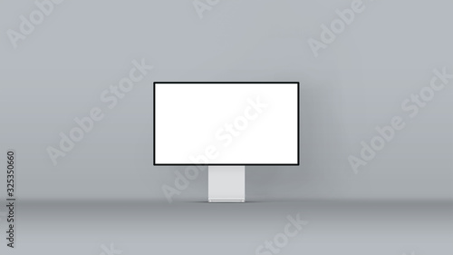 New desktop computer pro display on dark background. Modern blank flat monitor screen. Modern creative workspace background. Front view.
