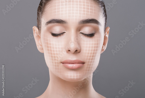 Foto Cose up portrait of attractive woman with closed eyes