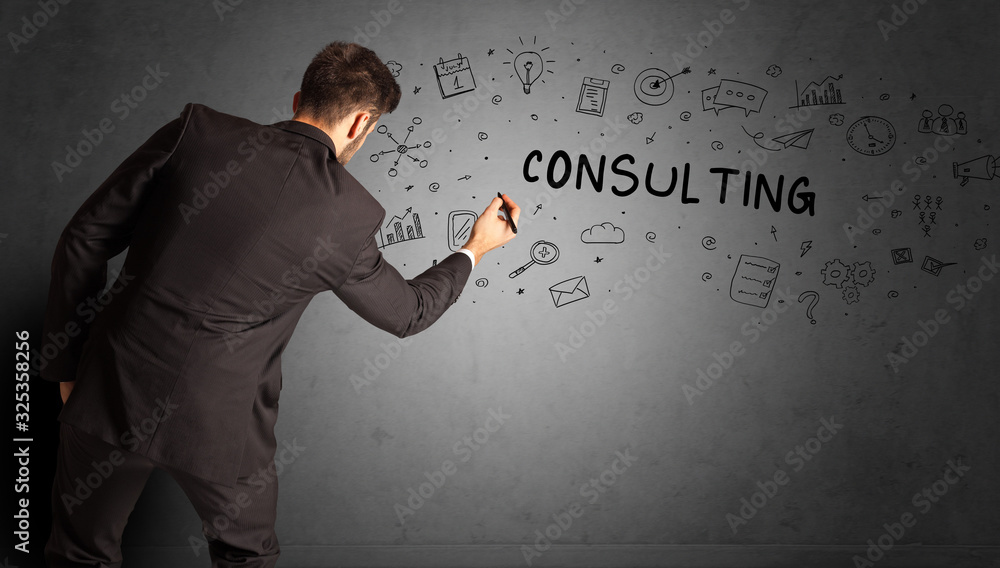 businessman drawing a creative idea sketch with CONSULTING inscription, business strategy concept businessman drawing a creative idea sketch with CONSULTING inscription, business strategy concept