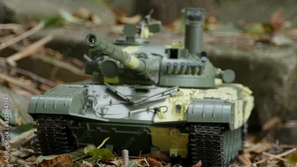tank in green spotted camouflage coloring camera in motion, front view tank in green spotted camouflage coloring camera in motion, front view