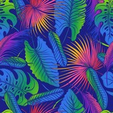 Tropical palm leaves seamless vector floral jungle colourful summer blue pattern background.