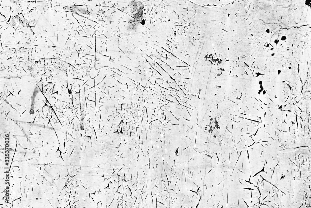 Texture of a metal wall with cracks and scratches which can be used as a background Texture of a metal wall with cracks and scratches which can be used as a background