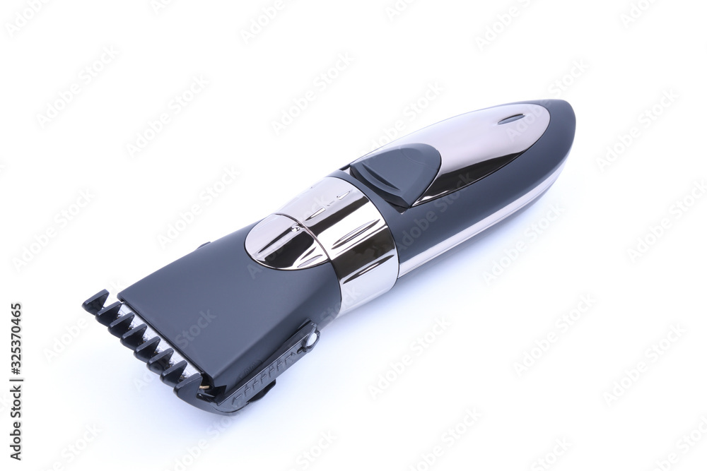 Wireless hair trimmer and beard isolated on a white background. Hair dryer Wireless hair trimmer and beard isolated on a white background. Hair dryer