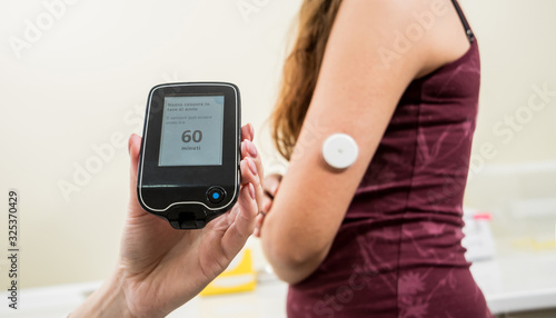 Medical device for glucose check. Continuous glucose monitoring pod.  photo