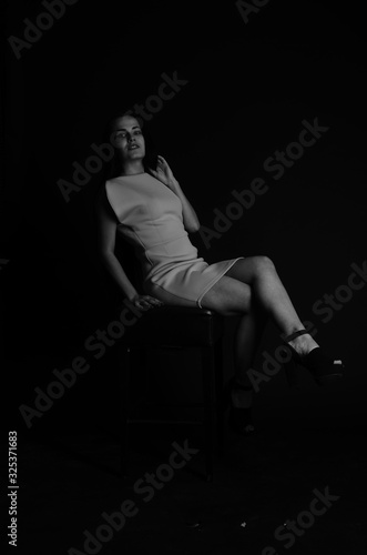 Young beautiful woman in a fashionable linen luxury brunette in the Studio.