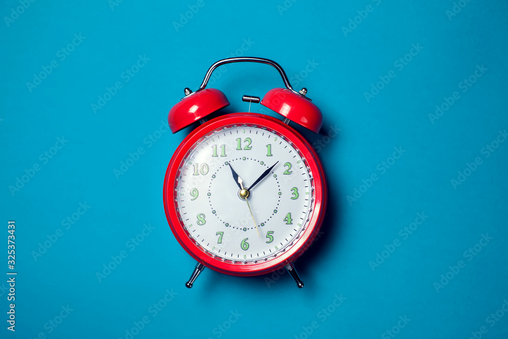 Alarm clock on the color background. Alarm clock on the color background.