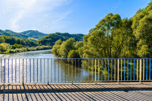 Bridge over Dunajec river and Velo Dunajec cycling road near Nowy Sacz, Poland
