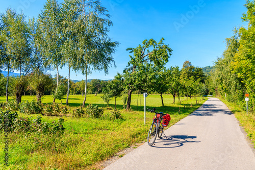 Cross touring bicycle on Velo Dunajec cycling road near Nowy Sacz, Poland photo