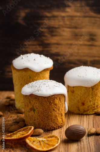 Three easter cake on wooden background