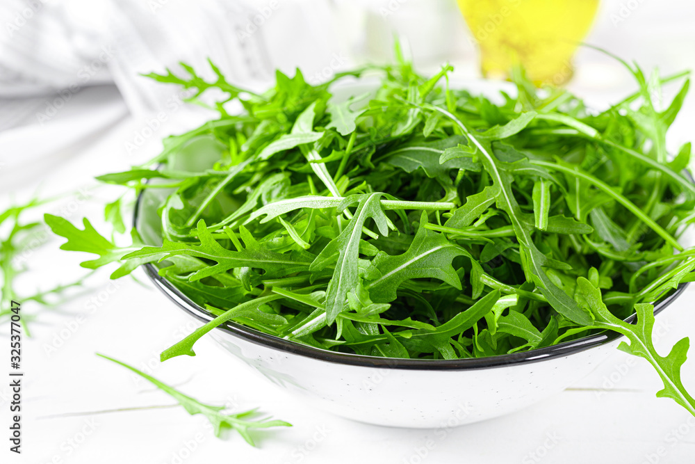 Fresh arugula or rocket leaves salad, rucola Fresh arugula or rocket leaves salad, rucola