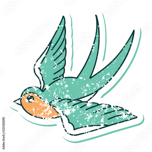 distressed sticker tattoo style icon of a swallow