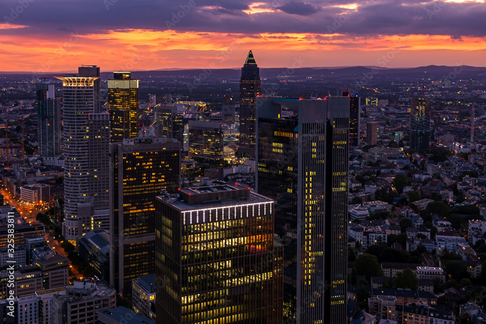 Obraz premium Aerial view over the skyscrapers of Frankfurt at sunset