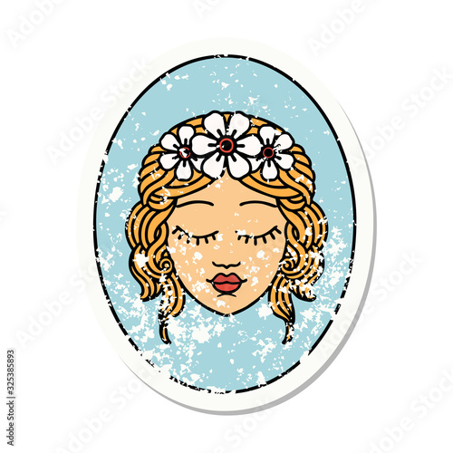 traditional distressed sticker tattoo of a maiden with eyes closed