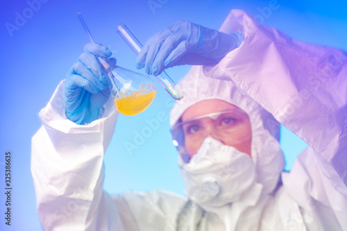 The chemist compares the ch...