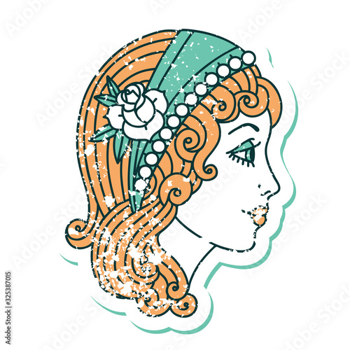 distressed sticker tattoo style icon of a gypsy head