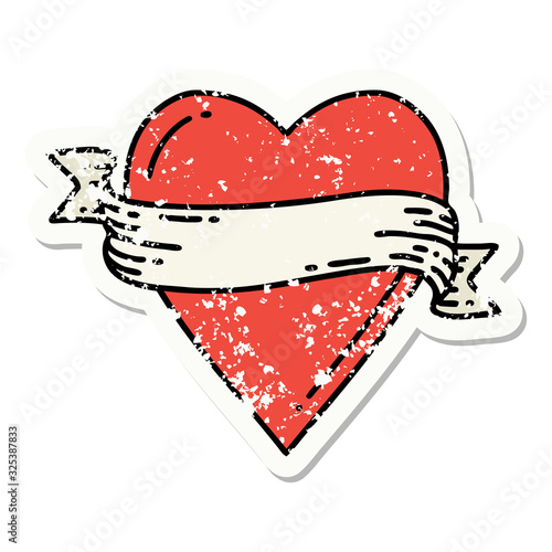 traditional distressed sticker tattoo of a heart and banner
