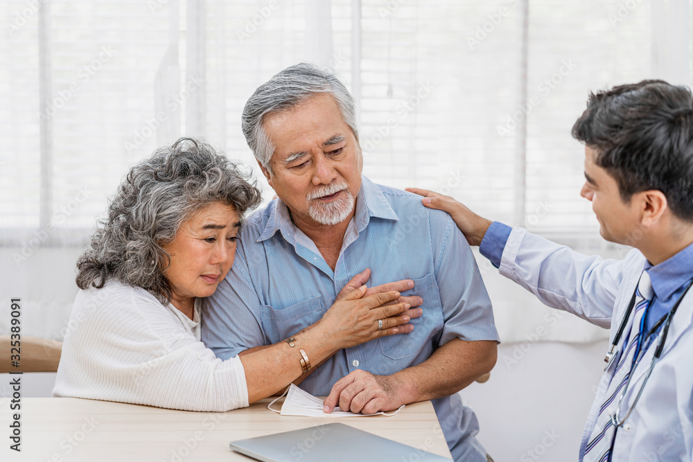 Doctor using stethoscope for auscultate Asian grandparent patient in house, service Life insurance at home, healthcare with Long live and Elderly society, Prevent epidemic concept Doctor using stethoscope for auscultate Asian grandparent patient in house, service Life insurance at home, healthcare with Long live and Elderly society, Prevent epidemic concept