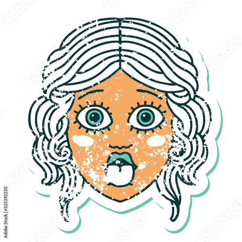 distressed sticker tattoo style icon of female face sticking out tongue