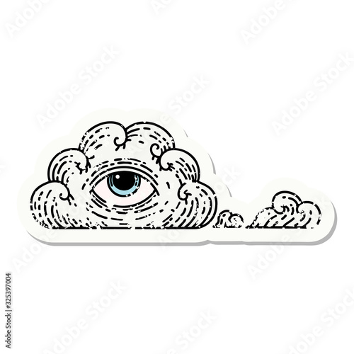 traditional distressed sticker tattoo of an all seeing eye cloud