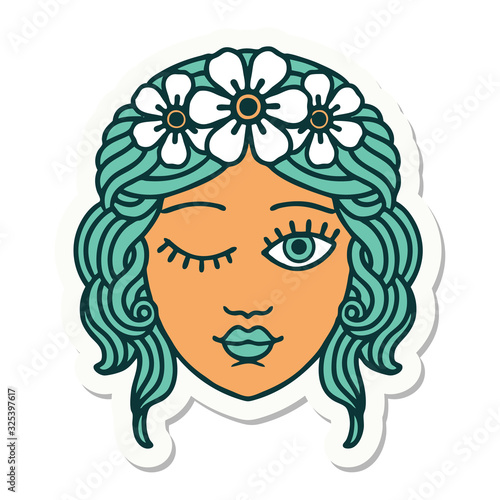 tattoo style sticker of a maidens face winking