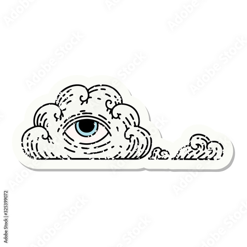 traditional distressed sticker tattoo of an all seeing eye cloud