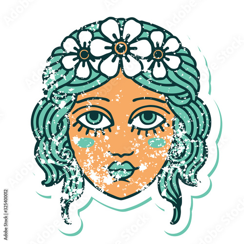 distressed sticker tattoo style icon of female face with crown of flowers