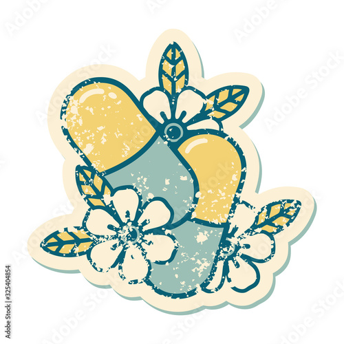 distressed sticker tattoo style icon of pills and flowers