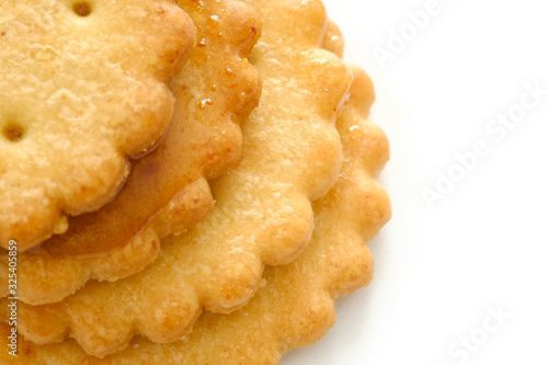 Stack of sweetmeal digestive biscuits isolated on white background photo