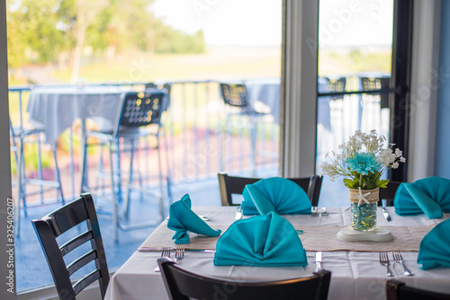 costal theme table and chairs in restaurant