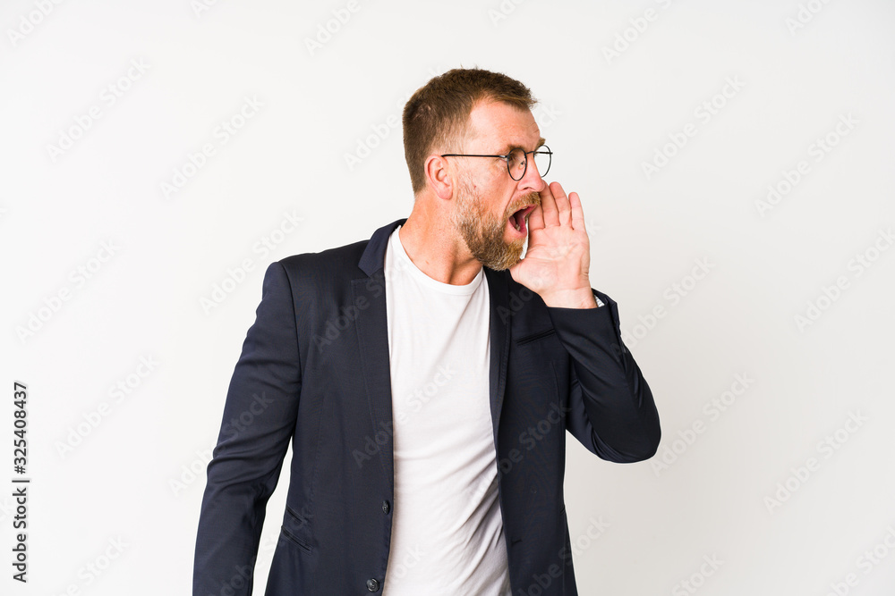 Senior business man isolated on white background shouting and holding palm near opened mouth. Senior business man isolated on white background shouting and holding palm near opened mouth.