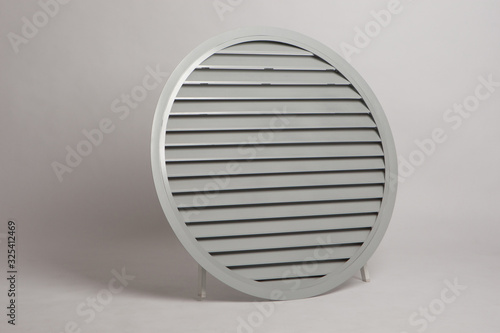 Round ventilation grille on...