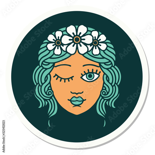 tattoo style sticker of a maidens face winking
