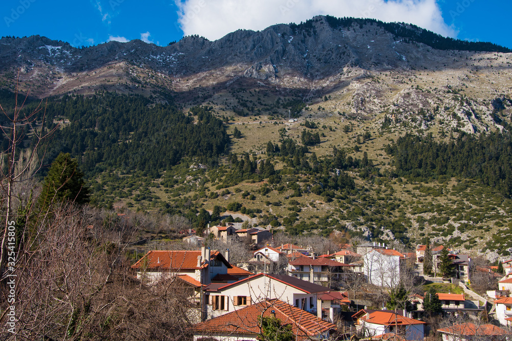 View of traditional architecture of Agoriani or Eptalofos village, a winter destination near Parnassos mountain in Greece