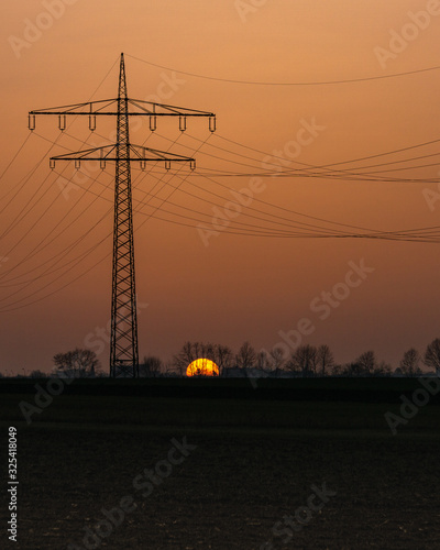 a current mast in the sunset